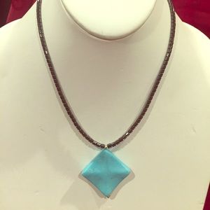 Hematite with turquoise.